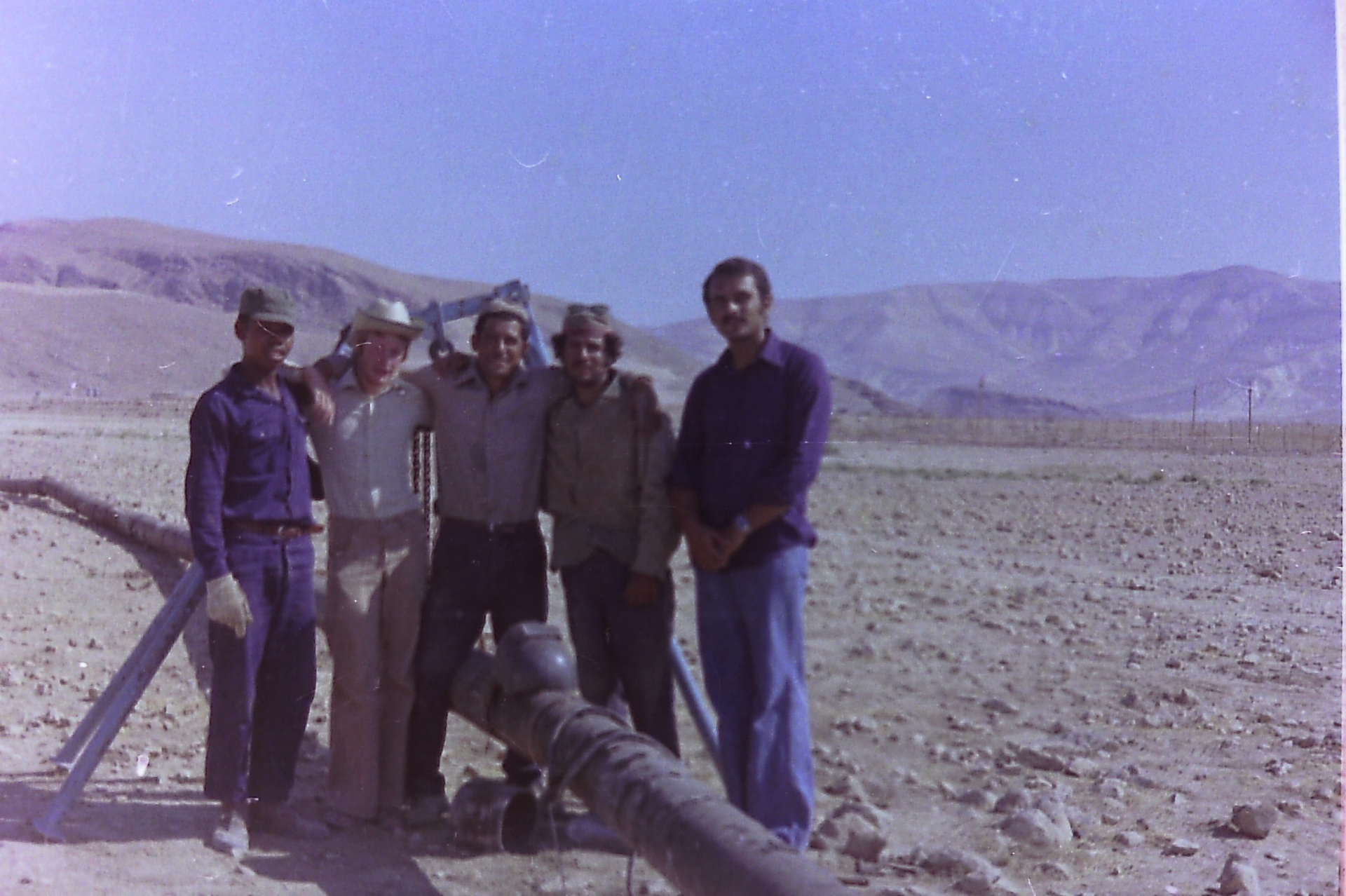 Samsam (far right) with the workers and volunteers who built the Fasayel pipeline — 1970s.