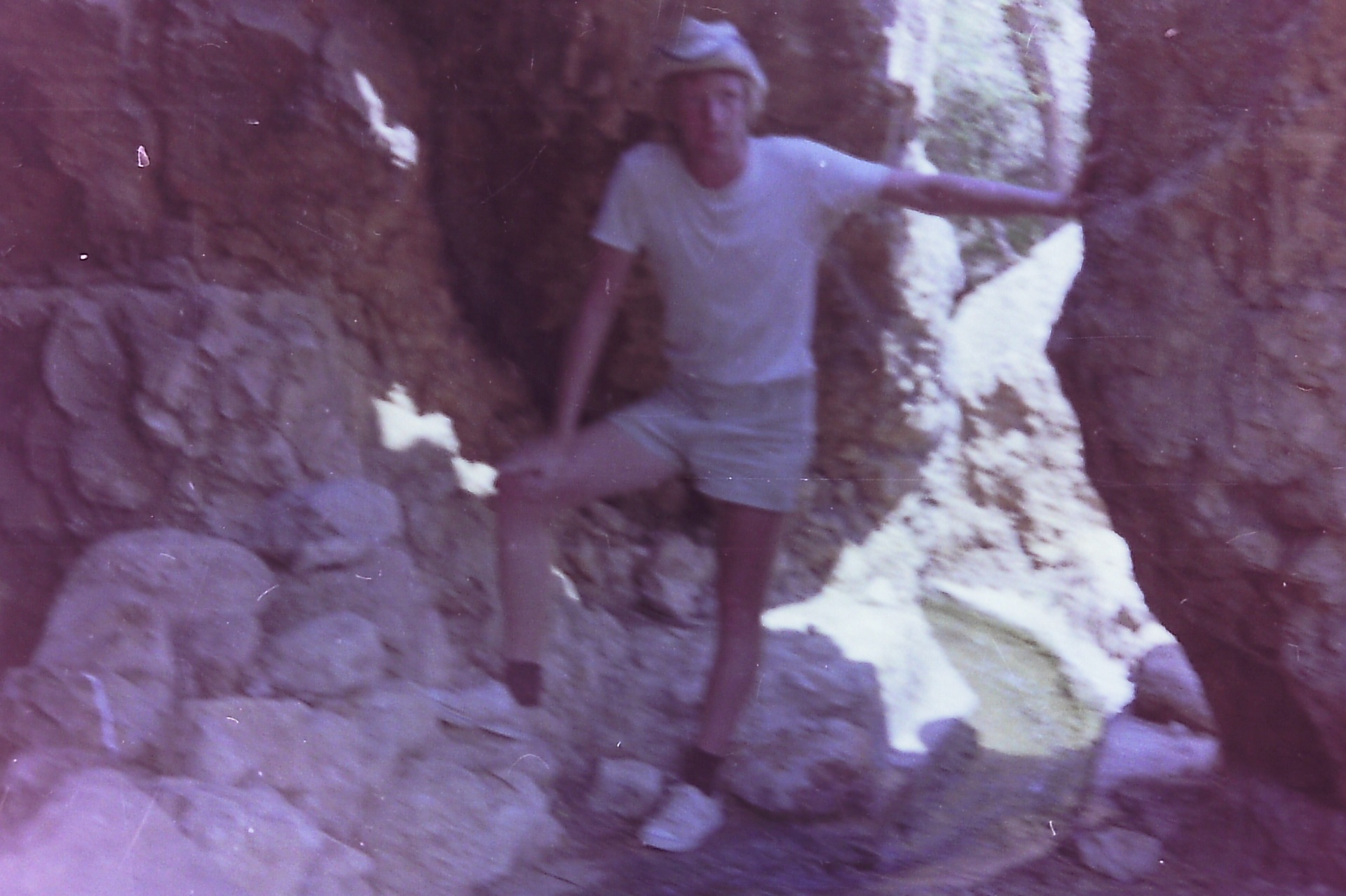 A European volunteer inside the Roman pool excavation.