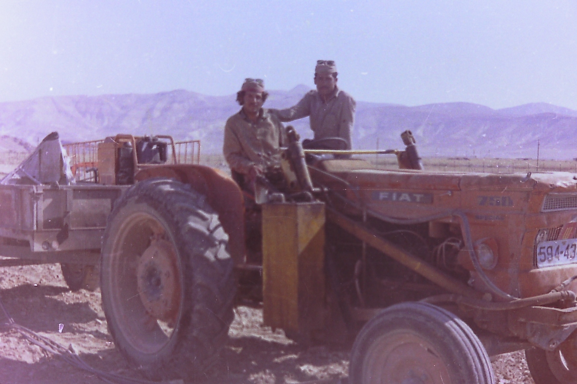 Workers on the Fiat 750 tractor in the Fasayel fields.